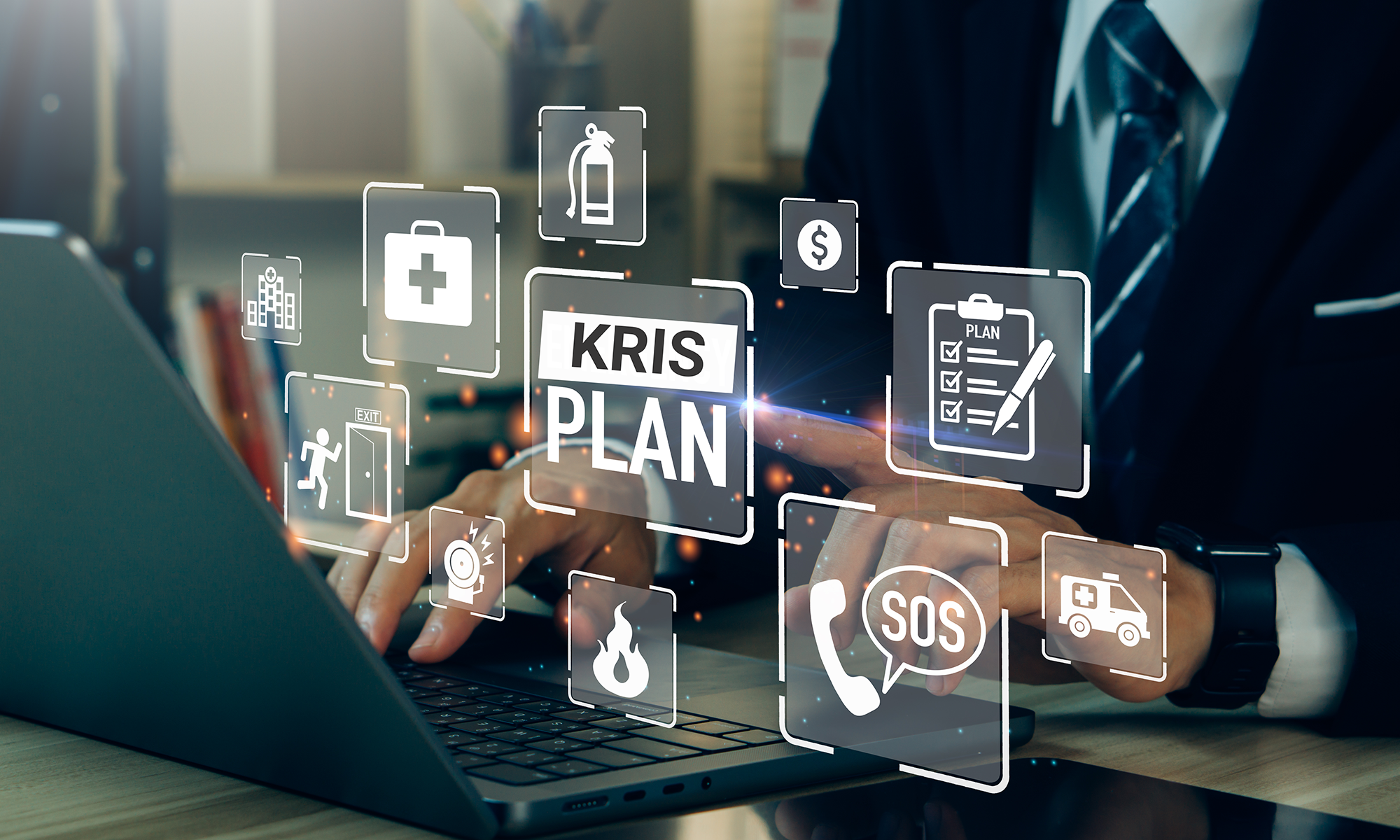 man som sitter bakom sin dator. runt datorn flyger det en massa ikoner.