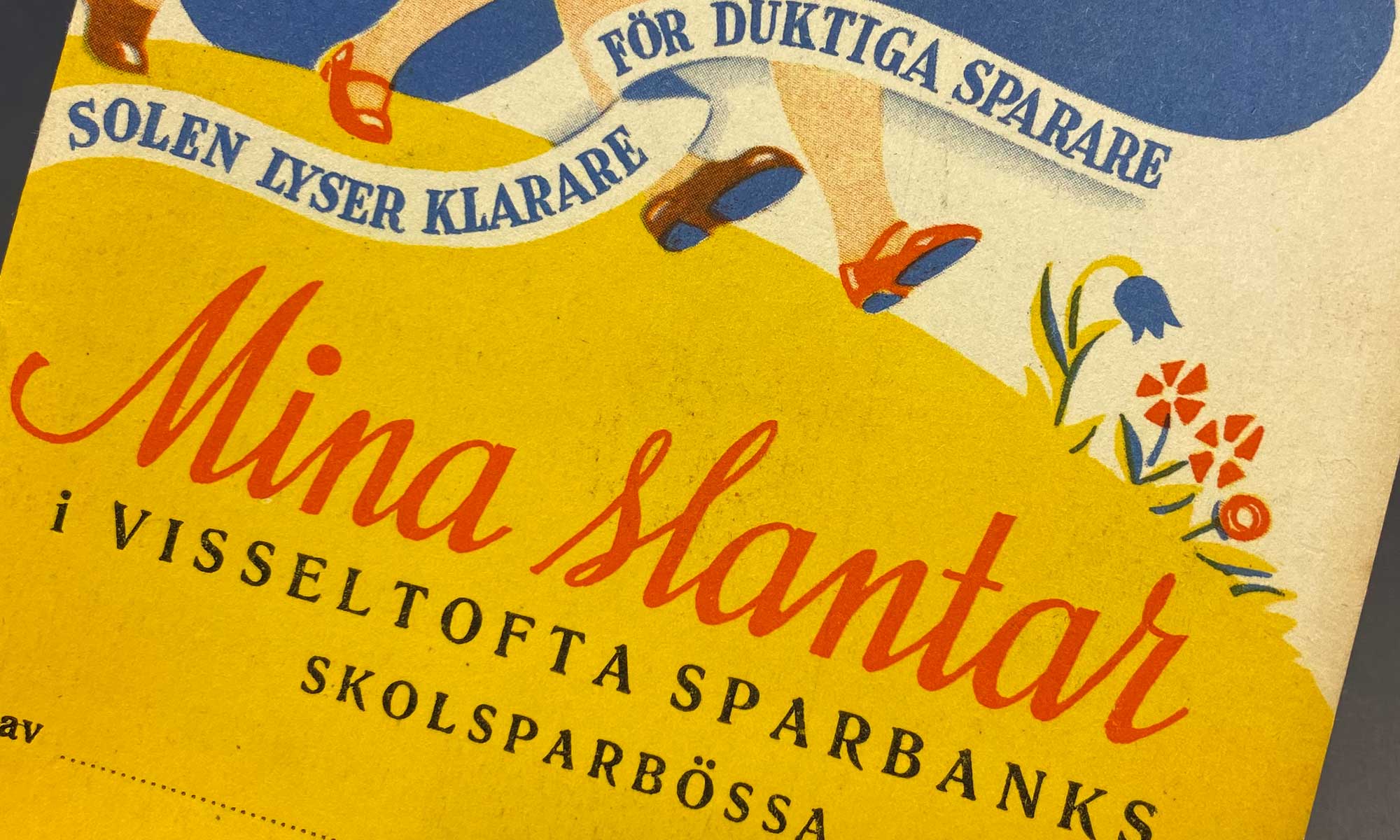 en närbild på en gammal skolsparbok från Visseltofta skola